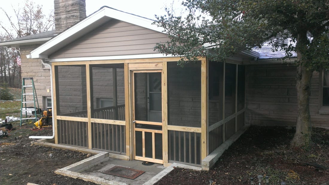 Screened in deck construction project